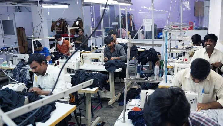 Garment workshop with sewing machines and work in progress